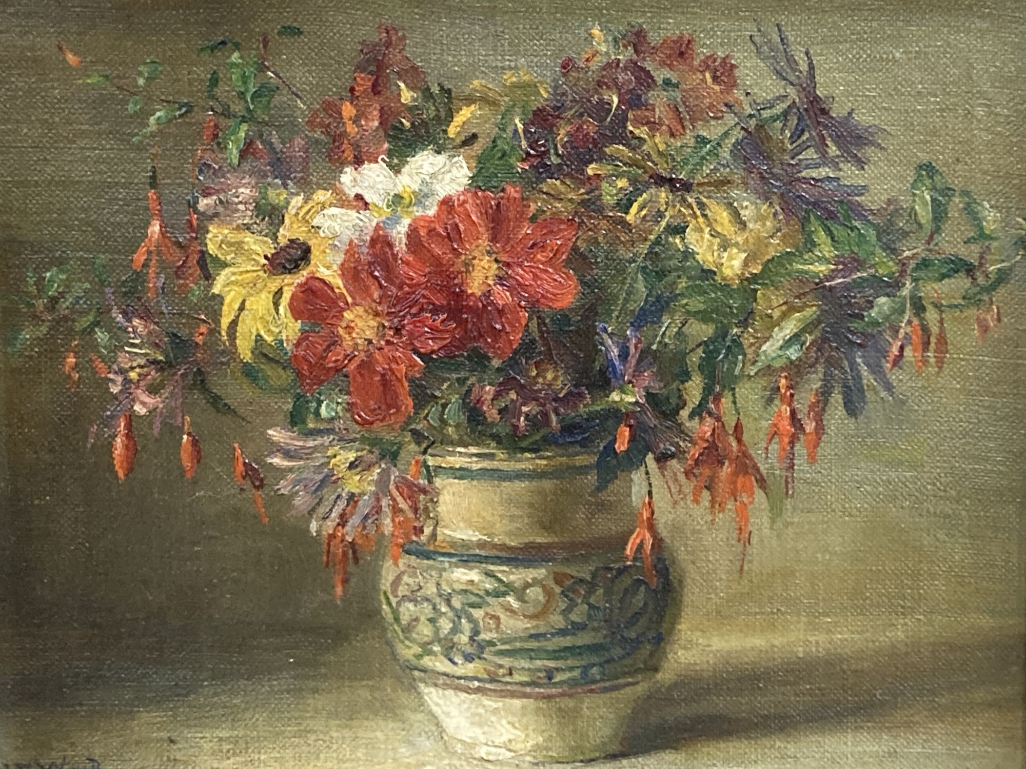 Catherine M. Wood (Exh.1880-1939), oil on canvas board, Still life of flowers in a Poole pottery vase, signed, 17 x 22cm
